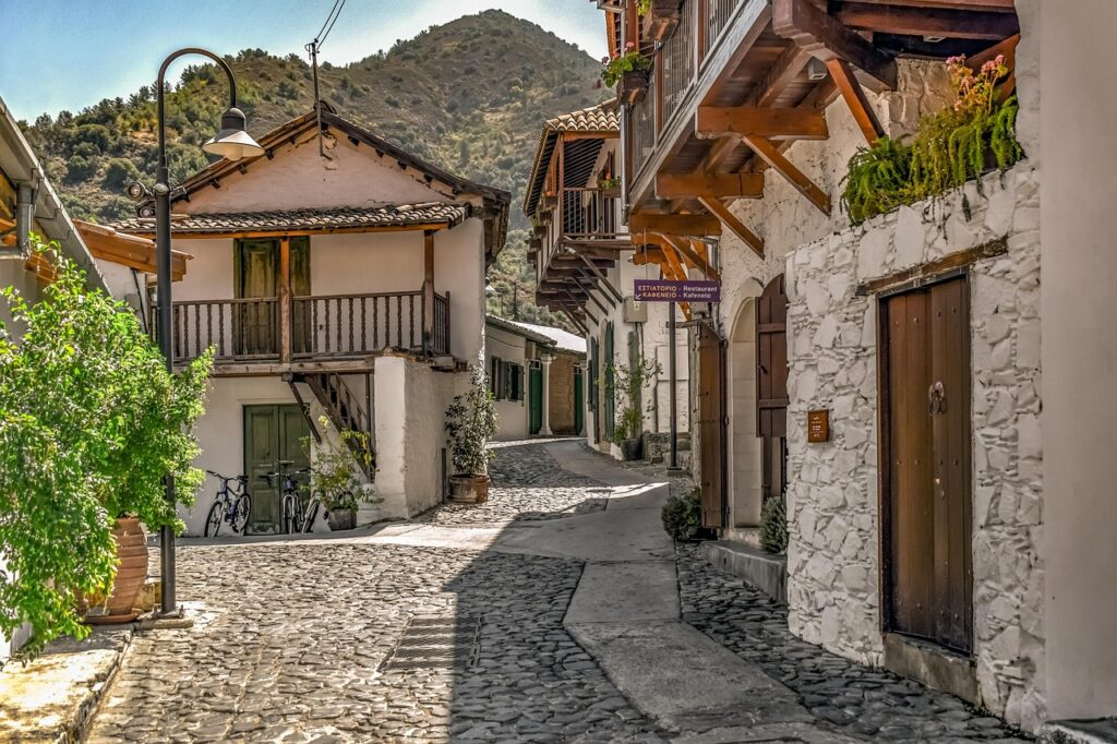 Scenic mountain road in Cyprus leading to a remote traditional village