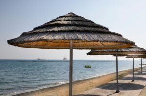 Wide sandy shoreline and calm blue waters at Lady’s Mile Beach near Limassol, Cyprus