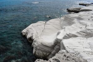 White limestone cliffs and crystal-clear sea at Governor’s Beach near Limassol, Cyprus
